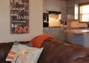 Native Stone House Livingroom - kitchen view