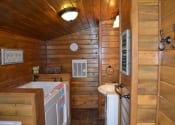 Native Stone House bathroom with laundry #2