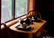 LH Dinner table with window overlook